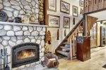 Fireplace and loft stairs